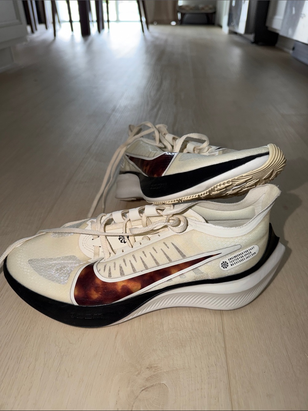 Nike Women’s Running Sneakers in Cream with Brown Accent